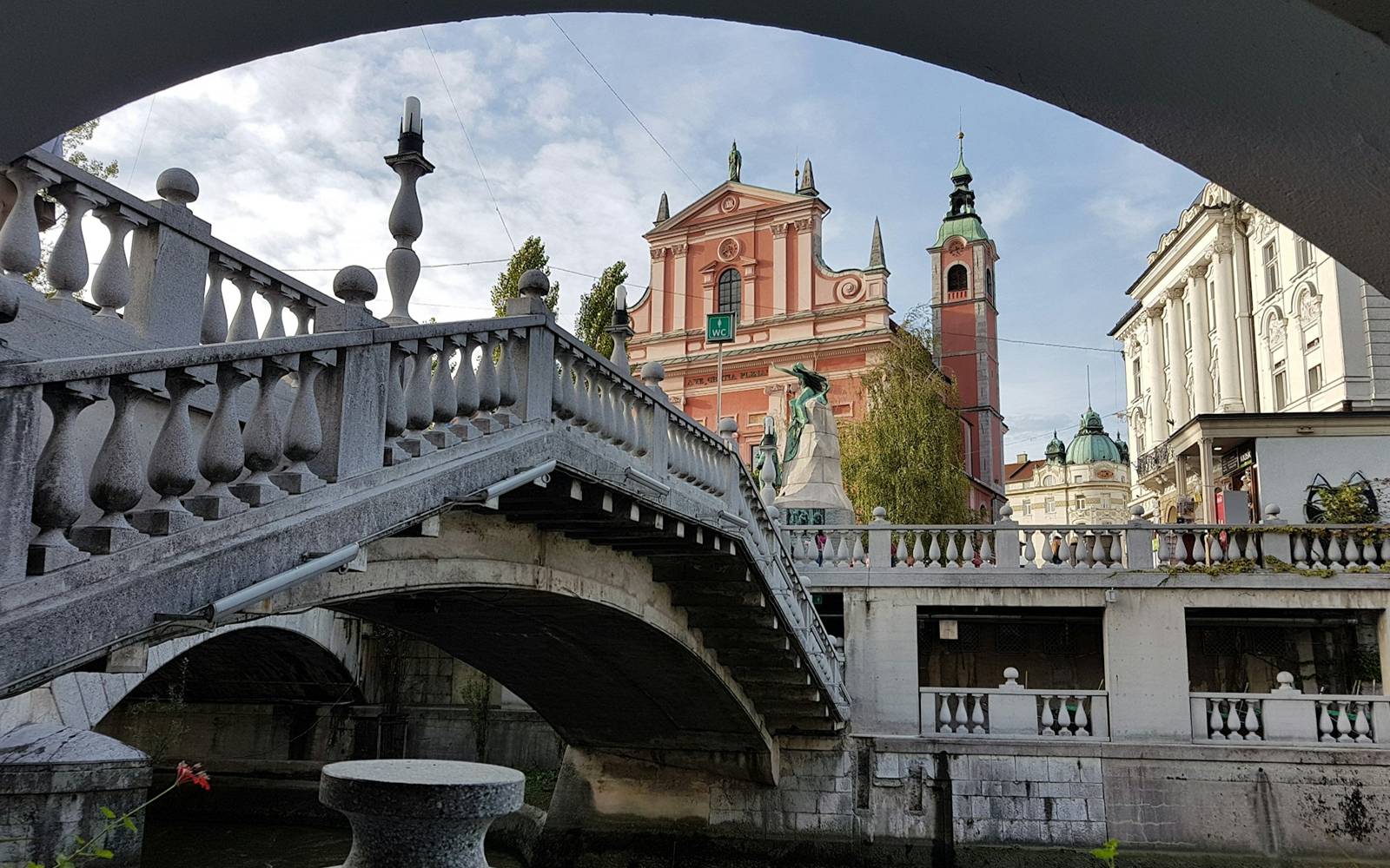 Bridge with historic buildings on the other side, in Ljubljana Slovenia